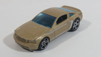 2007 Hot Wheels 2005 Ford Mustang GT Champagne Gold Die Cast Toy Car Vehicle