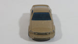 2007 Hot Wheels 2005 Ford Mustang GT Champagne Gold Die Cast Toy Car Vehicle