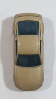 2007 Hot Wheels 2005 Ford Mustang GT Champagne Gold Die Cast Toy Car Vehicle