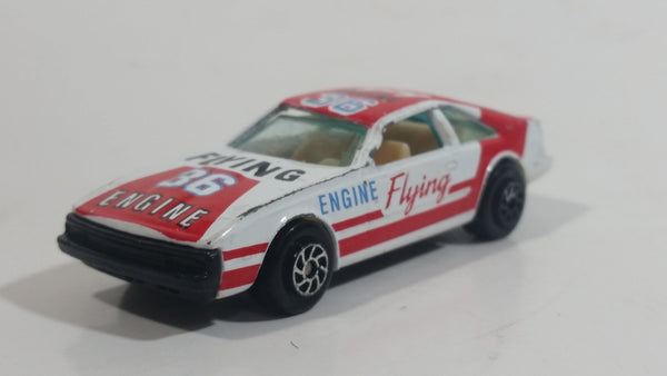 Vintage Yatming Toyota Celica Flying Engine #36 No. 1036 White Red Die Cast Toy Race Car Vehicle