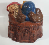 Vintage 1970s Gnome Dwarf Sleeping on a Tree Stump House with Fawn Peaking Through Door Ceramic Cookie Jar