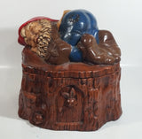 Vintage 1970s Gnome Dwarf Sleeping on a Tree Stump House with Fawn Peaking Through Door Ceramic Cookie Jar