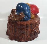 Vintage 1970s Gnome Dwarf Sleeping on a Tree Stump House with Fawn Peaking Through Door Ceramic Cookie Jar