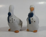 1990s Pair of White Goose Geese with Blue Bows Ceramic Salt and Pepper Shakers