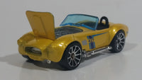 2012 Hot Wheels Shelby Classic Cobra Convertible Metalflake Light Gold Die Cast Toy Car Vehicle w/ Opening Hood