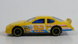 2011 Hot Wheels Dodge Charger Stock Car Yellow #82 Holst Wheels Die Cast Toy Car Vehicle