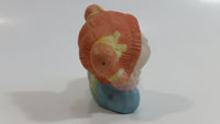 1984 OAA Cabbage Patch Kids Orange Hair Girl in Light Blue Laying Ceramic Figurine