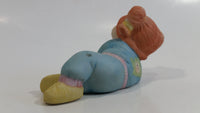 1984 OAA Cabbage Patch Kids Orange Hair Girl in Light Blue Laying Ceramic Figurine