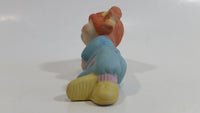 1984 OAA Cabbage Patch Kids Orange Hair Girl in Light Blue Laying Ceramic Figurine