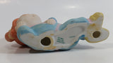 1984 OAA Cabbage Patch Kids Orange Hair Girl in Light Blue Laying Ceramic Figurine