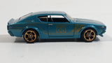 2014 Hot Wheels Night Burnerz Nissan Skyline H/T 2000GT-R Teal Die Cast Toy Car Vehicle