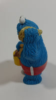 Applause Muppets Sesame Street Cookie Monster Character In Beach Shorts with a Pail of Shells Holding a Conch Shell To His Ear 3" Tall Hard Rubber PVC Toy