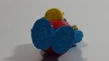 Applause Muppets Sesame Street Cookie Monster Character In Beach Shorts with a Pail of Shells Holding a Conch Shell To His Ear 3" Tall Hard Rubber PVC Toy