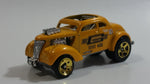 2010 Hot Wheels HW Performance Pass'n Gasser Yellow Gold Die Cast Toy Race Car Vehicle