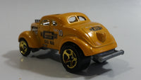 2010 Hot Wheels HW Performance Pass'n Gasser Yellow Gold Die Cast Toy Race Car Vehicle