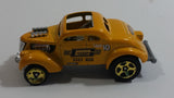 2010 Hot Wheels HW Performance Pass'n Gasser Yellow Gold Die Cast Toy Race Car Vehicle