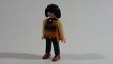 1994 Geobra Playmobil Black Haired Pirate Man Black Bottoms Tan Orange Top White Sleeves Stubble and Eye patch 3" Tall Toy Figure