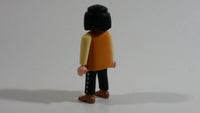 1994 Geobra Playmobil Black Haired Pirate Man Black Bottoms Tan Orange Top White Sleeves Stubble and Eye patch 3" Tall Toy Figure