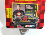 1997 Edition Racing Champions NASCAR #28 Ernie Irvan Havoline Texaco Ford Taurus Black Die Cast Toy Race Car Vehicle with Collector Card and Display Stand - New in Package Sealed