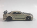 2009 Hot Wheels Dream Garage Nissan Skyline Metalflake Gold Die Cast Toy Car Vehicle