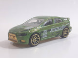 2010 Hot Wheels Nightburnerz 2008 Lancer Evolution Metallic Green Die Cast Toy Car Vehicle