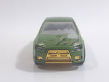 2010 Hot Wheels Nightburnerz 2008 Lancer Evolution Metallic Green Die Cast Toy Car Vehicle