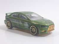 2010 Hot Wheels Nightburnerz 2008 Lancer Evolution Metallic Green Die Cast Toy Car Vehicle