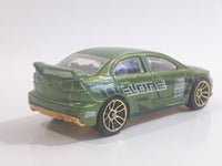 2010 Hot Wheels Nightburnerz 2008 Lancer Evolution Metallic Green Die Cast Toy Car Vehicle