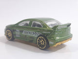 2010 Hot Wheels Nightburnerz 2008 Lancer Evolution Metallic Green Die Cast Toy Car Vehicle