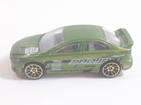 2010 Hot Wheels Nightburnerz 2008 Lancer Evolution Metallic Green Die Cast Toy Car Vehicle