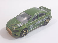 2010 Hot Wheels Nightburnerz 2008 Lancer Evolution Metallic Green Die Cast Toy Car Vehicle