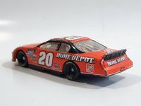 2007 Motorsports Authentics NASCAR #20 Tony Stewart The Home Depot 2004 Chevy Monte Carlo Orange 1/64 Scale Die Cast Toy Race Car Vehicle