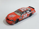 2007 Motorsports Authentics NASCAR #20 Tony Stewart The Home Depot 2004 Chevy Monte Carlo Orange 1/64 Scale Die Cast Toy Race Car Vehicle