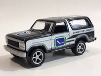 VHTF 1999 Racing Champions '80 Ford Bronco NHL Vancouver Canucks Ice Hockey Team Dark Blue and White Die Cast Toy Car Vehicle