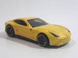 2014 Hot Wheels HW City - Speed Team Ferrari F12 Berlinetta Yellow Die Cast Toy Car Vehicle