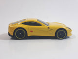 2014 Hot Wheels HW City - Speed Team Ferrari F12 Berlinetta Yellow Die Cast Toy Car Vehicle