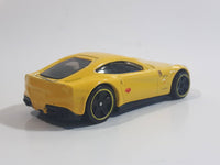 2014 Hot Wheels HW City - Speed Team Ferrari F12 Berlinetta Yellow Die Cast Toy Car Vehicle