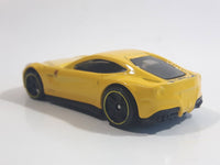 2014 Hot Wheels HW City - Speed Team Ferrari F12 Berlinetta Yellow Die Cast Toy Car Vehicle