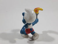 Vintage 1979 Peyo Smurf Character Olympic Athlete Running with Torch PVC Toy Figure