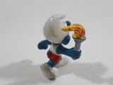 Vintage 1979 Peyo Smurf Character Olympic Athlete Running with Torch PVC Toy Figure