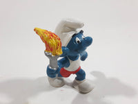 Vintage 1979 Peyo Smurf Character Olympic Athlete Running with Torch PVC Toy Figure