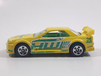 2004 Hot Wheels Truckin' Transporters Nissan Skyline Yellow Die Cast Toy Car Vehicle