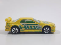 2004 Hot Wheels Truckin' Transporters Nissan Skyline Yellow Die Cast Toy Car Vehicle