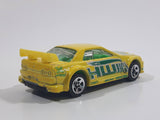 2004 Hot Wheels Truckin' Transporters Nissan Skyline Yellow Die Cast Toy Car Vehicle