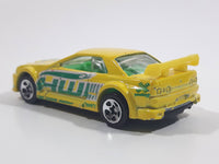 2004 Hot Wheels Truckin' Transporters Nissan Skyline Yellow Die Cast Toy Car Vehicle