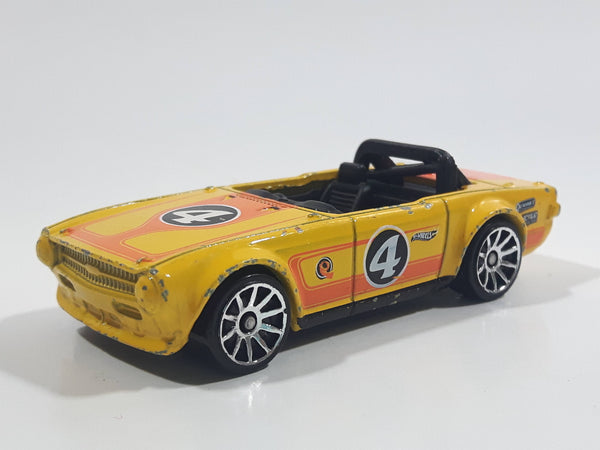 2011 Hot Wheels Track Stars Triumph TR6 Yellow #4 Die Cast Toy Race Car Vehicle