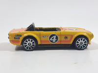 2011 Hot Wheels Track Stars Triumph TR6 Yellow #4 Die Cast Toy Race Car Vehicle