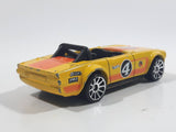 2011 Hot Wheels Track Stars Triumph TR6 Yellow #4 Die Cast Toy Race Car Vehicle