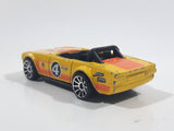 2011 Hot Wheels Track Stars Triumph TR6 Yellow #4 Die Cast Toy Race Car Vehicle