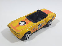 2011 Hot Wheels Track Stars Triumph TR6 Yellow #4 Die Cast Toy Race Car Vehicle